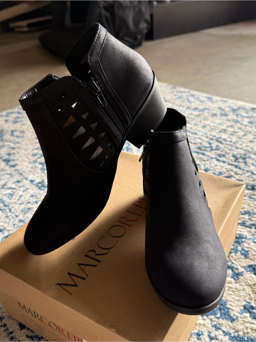 Marco  Black Cutout Ankle Booties with Side Zip